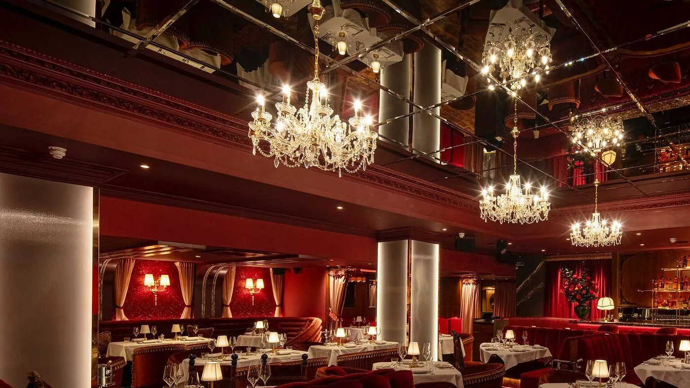 Mistress of Mayfair - red velvet booths bar